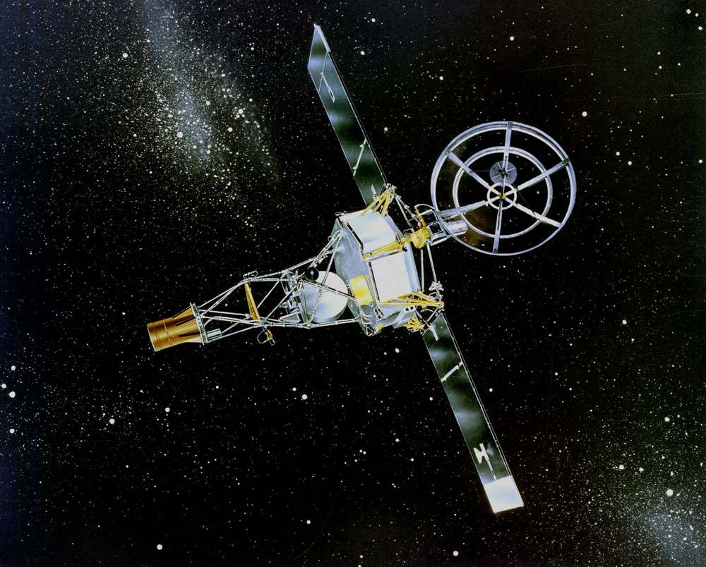 Painted spacecraft with two long panel wings and a spoked circular dish, stars behind