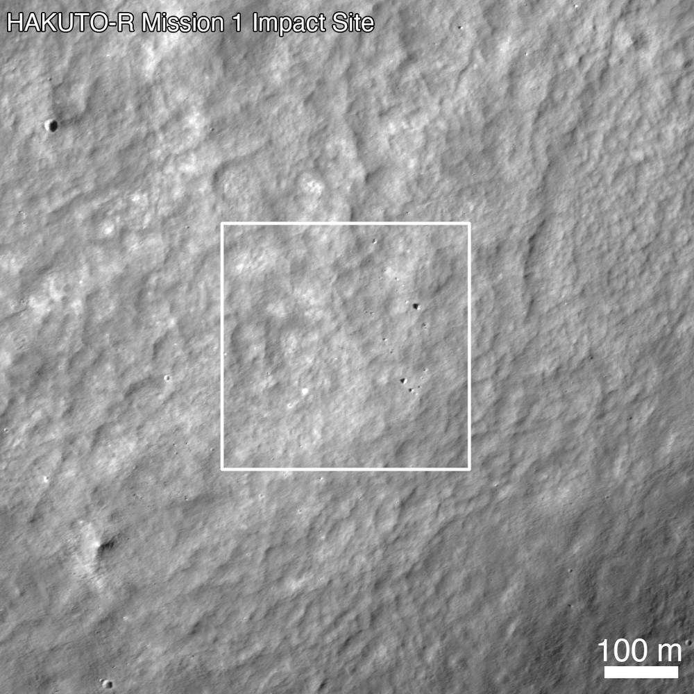 Grey orbital view with a large white square outlining a few dark specks