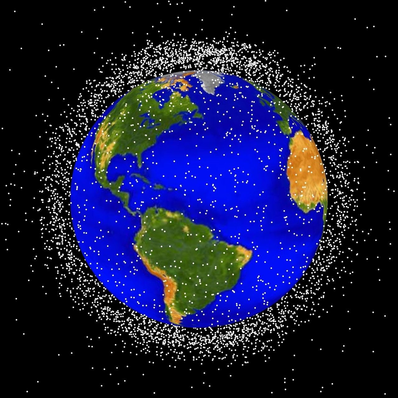 Computer plot of Earth shrouded in a dense cloud of tracked objects in low orbit